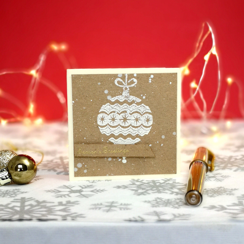 Handmade mini christmas card with white & gold details on kraft cardstock.