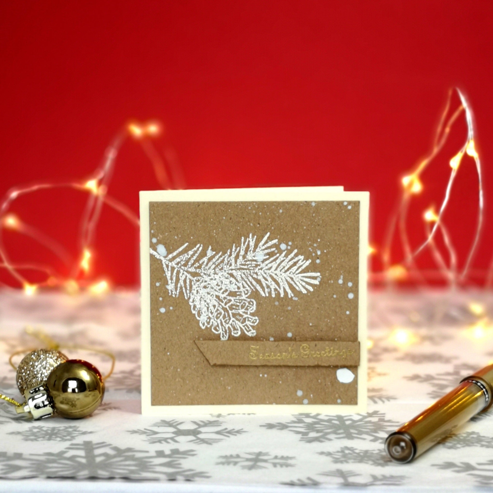 Handmade mini christmas card with white & gold details on kraft cardstock.