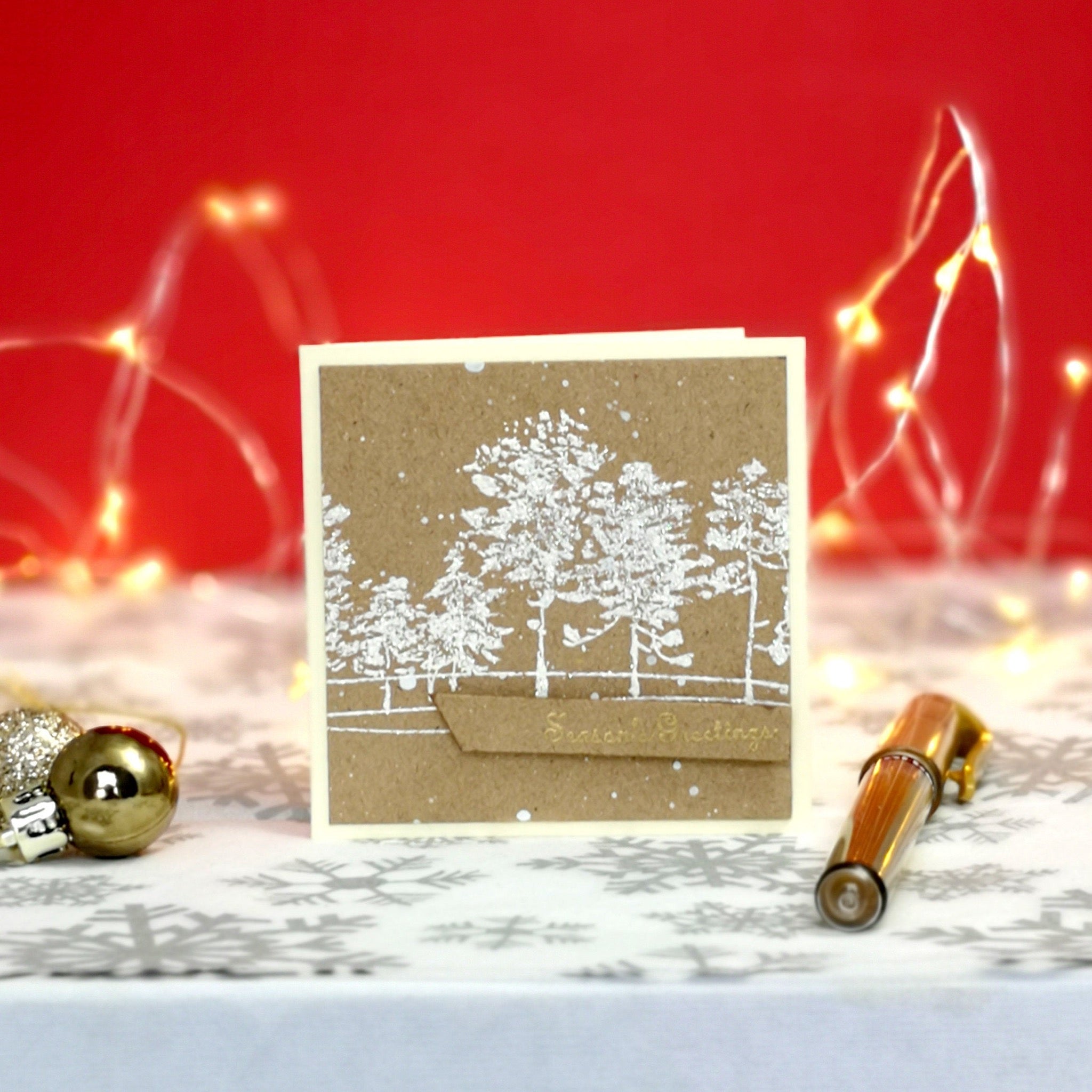 Handmade mini christmas card with white & gold details on kraft cardstock.