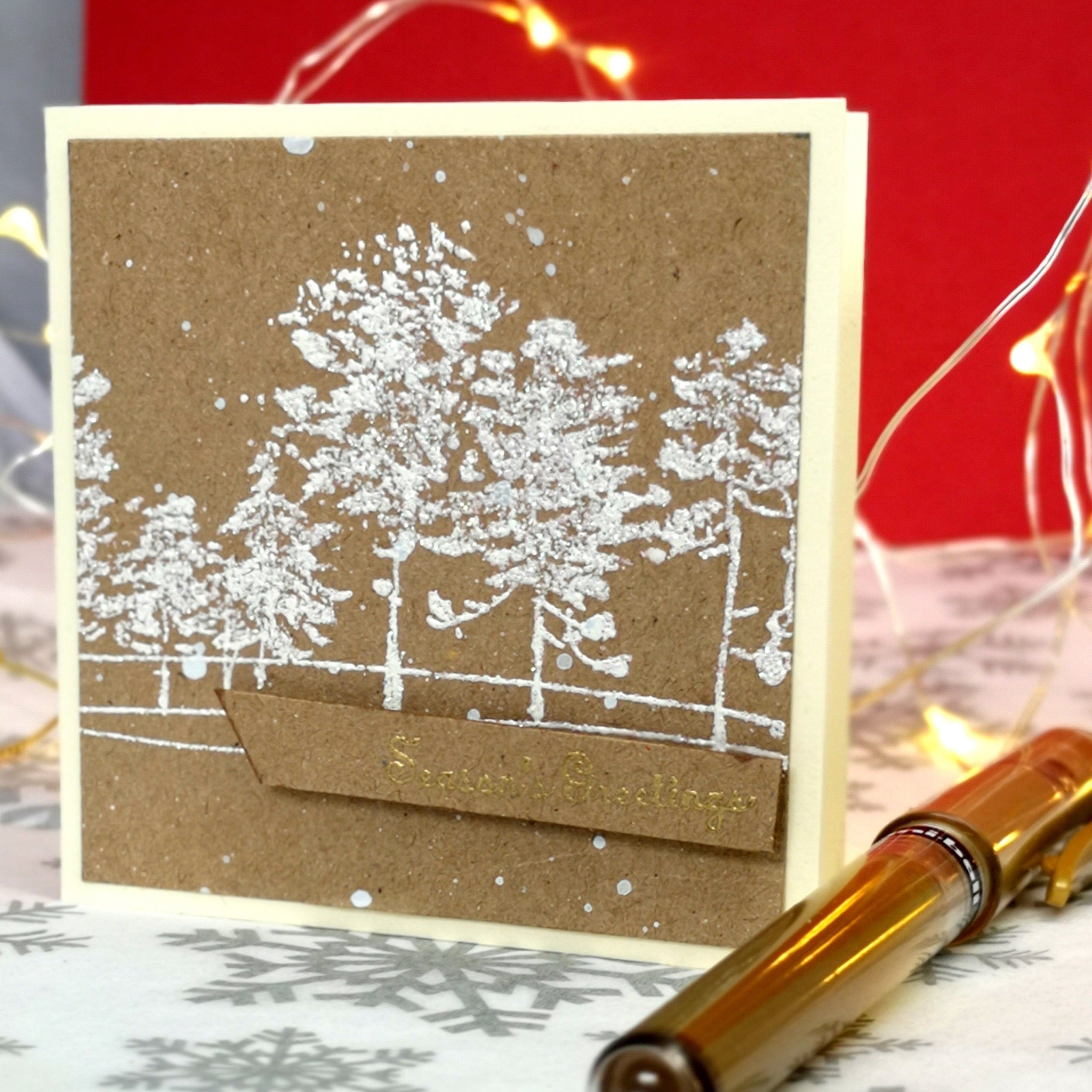 Handmade mini christmas card with white & gold details on kraft cardstock.